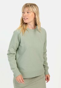 Lichtgroene sweatshirt van zacht katoen, met een ronde halslijn, lange mouwen en geribde boorden en zoom, met subtiele merktekens.