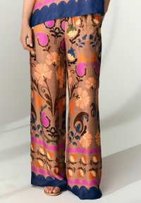 Next Nohavice - brown floral print