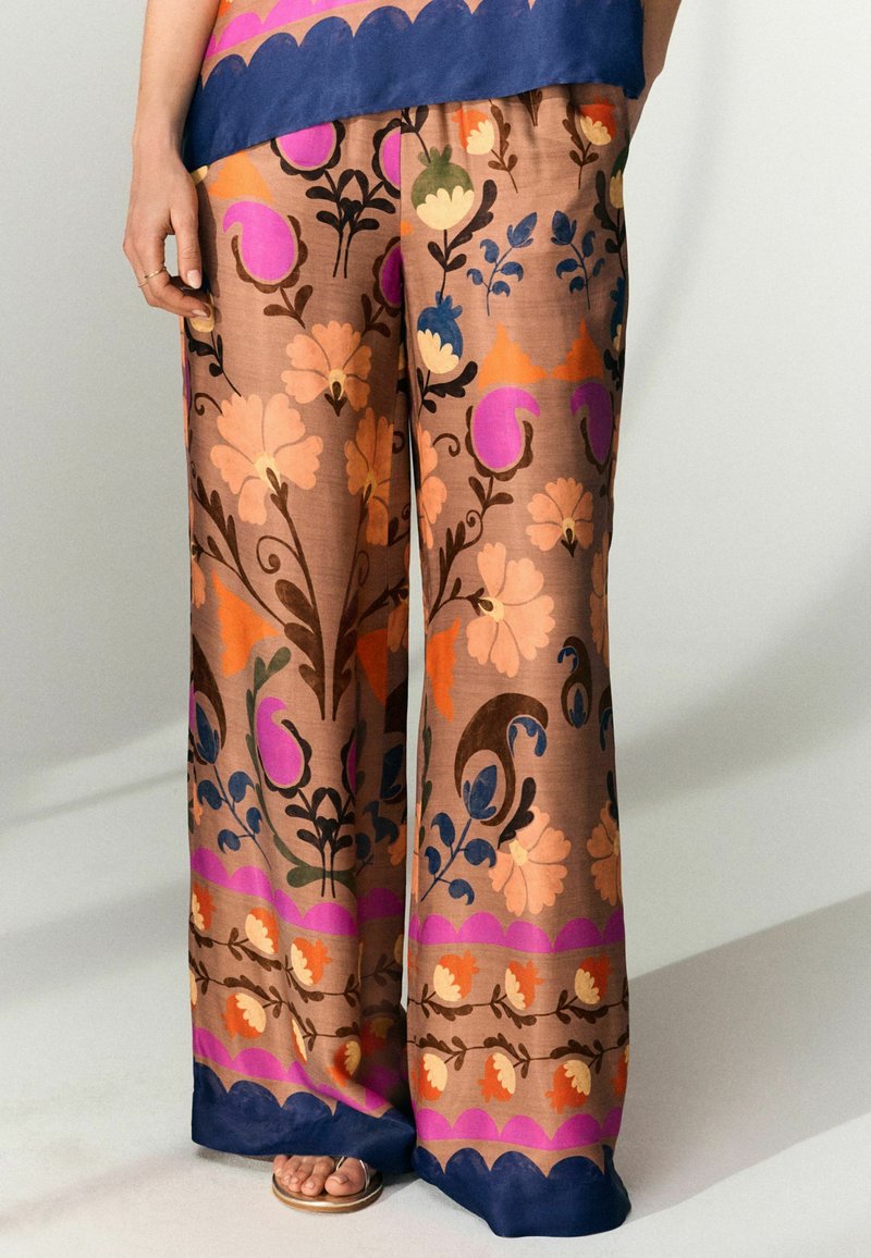 Next Nohavice - brown floral print
