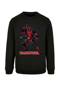 Fekete pulóver, amelyen egy piros és fekete karakter fegyverrel látható, sugárzó vonalakkal a háttérben, alatta a "DEADPOOL" felirattal.