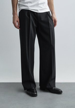 Nohavice - black beauty