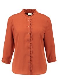 Rostfarbene Bluse aus strukturiertem Stoff, mit einem geschoppten Stehkragen und Knopfleiste, sowie Dreiviertelärmel mit gerafften Bündchen.