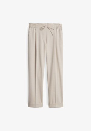 Pantaloni beige con una vestibilità rilassata, dotati di una vita elastica con cordino, tasche laterali e orli a risvolto. Texture liscia.