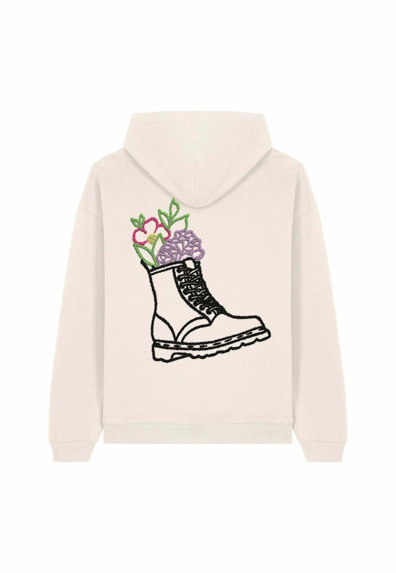 Felpa chiara con cappuccio, caratterizzata da un ricamo di un stivale nero con motivi floreali in rosa e viola, situato sulla schiena.