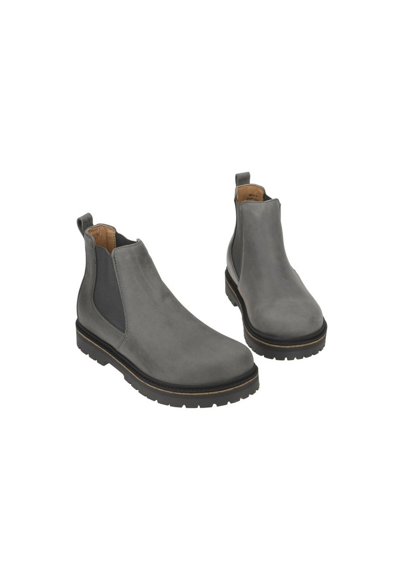 Grijze leren Chelsea-boots met elastische zijpanelen, ronde neus en gestructureerde zool. Voorzien van een trekband aan de achterkant voor gemakkelijk aan- en uittrekken.