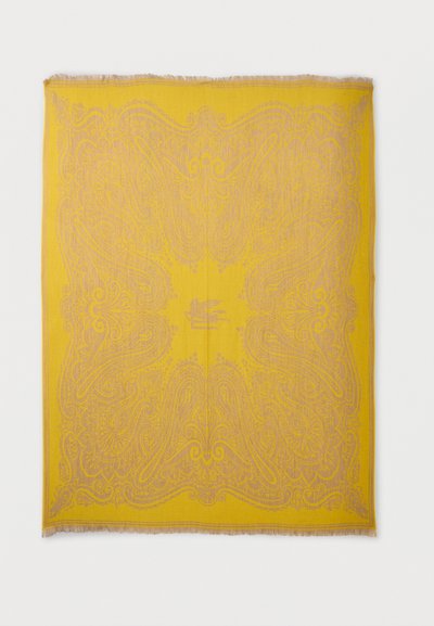 Tissu jaune avec des motifs cachemire complexes et un motif central d'oiseau, encadré par des bords frangés délicats.