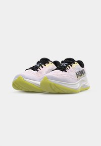 Lightweight running shoes featuring a pink mesh upper, black laces, yellow accents on the sole, and prominent "HOKA" branding.