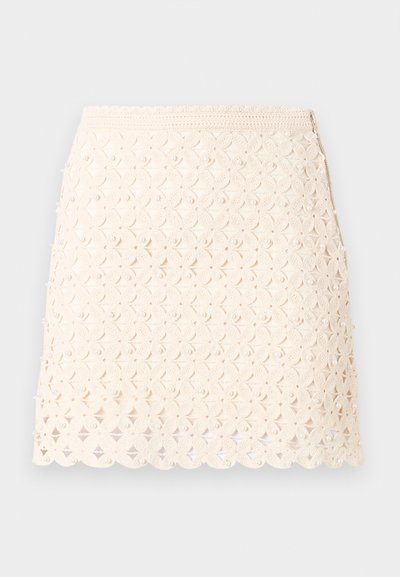 Μίνι φούστα σε κρεμ απόχρωση με φλοράλ δαντελένιο σχέδιο και μικρές διακοσμήσεις με πέρλες, οδοντωτή τελείωμα και πλαϊνό φερμουάρ.