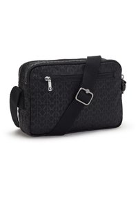 Black crossbody bag with geometric pattern. Features a zipped pocket, adjustable strap, and smooth polyester material. Compact rectangular shape.