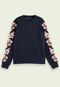Granatowa bluza z długimi rękawami, zdobiona białą i burgundową haftowaną florystyką. Okrągły dekolt z teksturowanej tkaniny oraz ściągacze przy rękawach i u dołu.