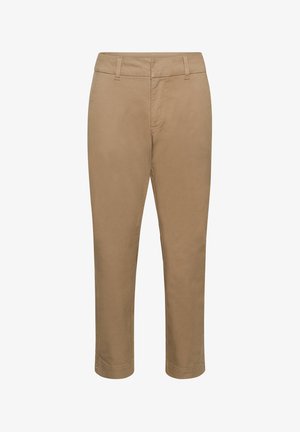 Pantalons beiges en tissu doux, avec une coupe droite, une taille standard et sans motifs ni embellissements visibles.