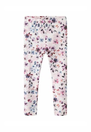 Leggings fleuris en tissu léger, avec un fond rose pastel parsemé de fleurs violettes et bleues ainsi que de feuilles vertes.