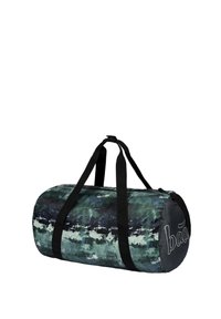 Duffle bag featuring a textured navy and green abstract pattern, round shape, black straps, and a logo printed in white.