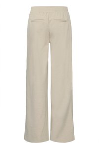Pantalon beige à jambes larges avec taille élastique et deux poches arrière horizontales, vu de dos sur fond blanc.