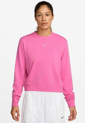 Sudadera rosa hecha de tela suave, con cuello redondo y puños acanalados. Tiene un pequeño logo blanco de Nike en el pecho.