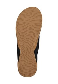 Black sandal with a textured fabric upper and a tan rubber sole featuring a wave pattern for traction and grip.