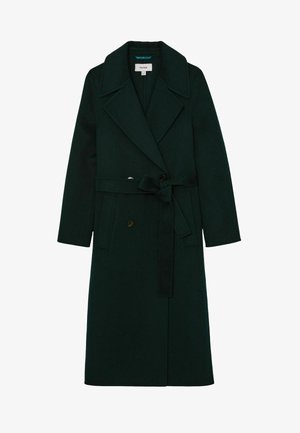 Mørkegrøn lang uldfrakke med brede slag, dobbeltknaplukning, sidelommer og et knyttet taljebælte.