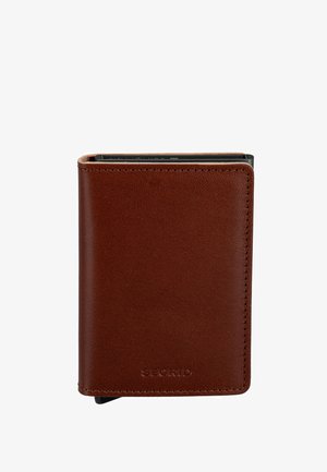 Compact brown leather wallet with stitching details and embossed Secrid logo, slightly open showing a black card inside.