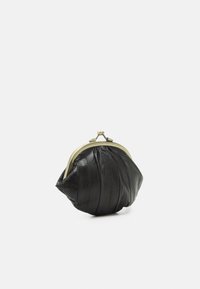 Black leather coin purse with a rounded shape, featuring a metal clasp closure and textured surface with subtle vertical lines.
