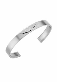 Bracelet manchette en acier inoxydable à finition brossée, avec un logo Aston Martin en relief centré sur le bracelet. Extrémités ouvertes pour un ajustement réglable.