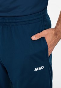JAKO CLASSICO - Tracksuit bottoms - blauweiss