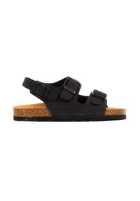 Sandale noire à bout ouvert avec trois boucles réglables, semelle intérieure en liège et semelle en caoutchouc noire, vue de profil sur fond blanc.