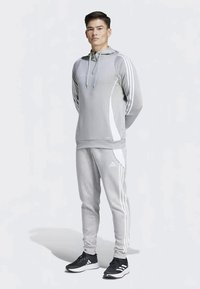 adidas Performance TIRO24 SWEAT PANT - Jogginghose - medium grey heather/white