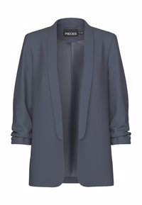 Blazer grigio scuro con silhouette sagomata, apertura frontale e maniche arrotolate. Tessuto liscio senza chiusure visibili o fantasie. Etichetta del marchio all'interno.