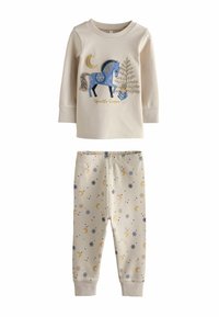 Lys beige pyjamasæt: langærmet top med blå enhjørning og guld detaljer, samt mønstrede bukser med stjerner og måner i blå og guld.