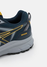 ASICS Maastojuoksukengät - blue