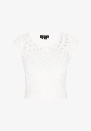 Valkoinen lyhyt villapaita, joka on valmistettu tekstuurisesta neulekankaasta, jossa on lyhyet hihat ja koko paidan halki kulkeva timanttikuvio.