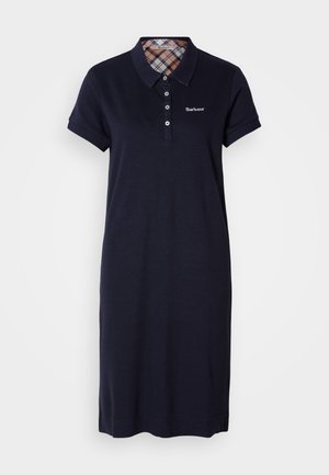 Rochie polo bleumarin cu mâneci scurte, guler și o clapetă interioară în carouri. Prezintă un logo brodat pe piept. Croială clasică, lungime până la genunchi.