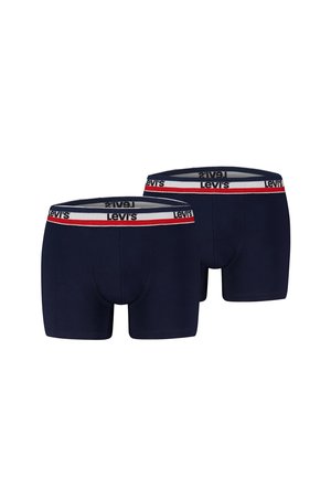 Paar marineblaue Levi's Boxershorts mit weißen, roten und marinefarbenen Markenbund, nebeneinander auf weißem Hintergrund dargestellt.