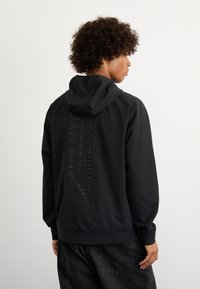 Puma LIFE JACKET - Lichte jas - black