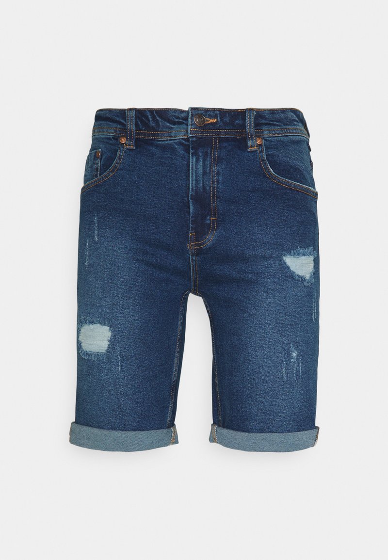 Denim kratke hlače v temno modri barvi z uničenim videzom, z zavitimi robovi, več žepi in vidnimi šivi.