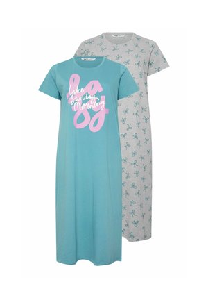 Turkis t-shirt med store pink bogstaver og hvid kursiv tekst med teksten "like Sunday Morning" på fronten.