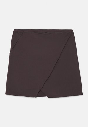 Black mini skirt made of smooth fabric, featuring a diagonal wrap design and a straight hem. No visible fasteners or patterns.