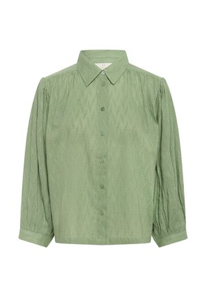 Chemise boutonnée vert clair avec un motif texturé, dotée d'un col pointu et de manches longues avec poignets froncés.