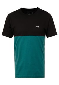 Kortärmad t-shirt med övre halvan i svart och nedre halvan i teal, tillverkad av bomull. Har en liten vit Vans-logotyp på bröstet.