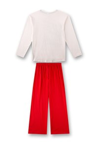White long-sleeve shirt with round neckline, paired with loose red pants featuring an elastic waistband. Soft, lightweight fabric throughout.