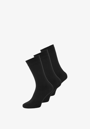 Zwarte katoenen sokken, drie paar, middenkuitlengte, gladde textuur, elastische bovenkanten voor een veilige pasvorm, geen zichtbare patronen of accenten.