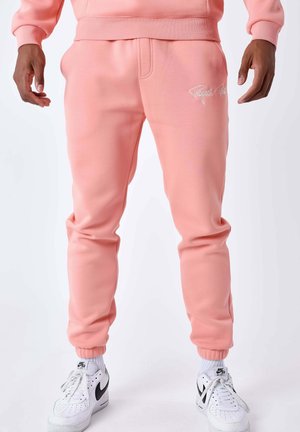 Jogginghose - abricot   blanc cassé