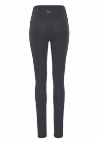 Leggings noirs avec une taille haute et un détail logo à l'arrière. Fabriqués à partir d'un matériau lisse et extensible avec une silhouette ajustée.
