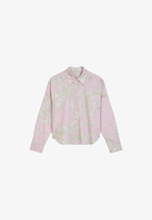 Pink long-sleeve shirt with a floral pattern in light green. Features a button-down collar and curved hem. Made from a smooth fabric.