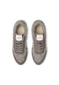 Gray sneakers featuring a fuzzy upper material, a soft interior lining, and textured accents. Laces are gray, with branding on the tongue.