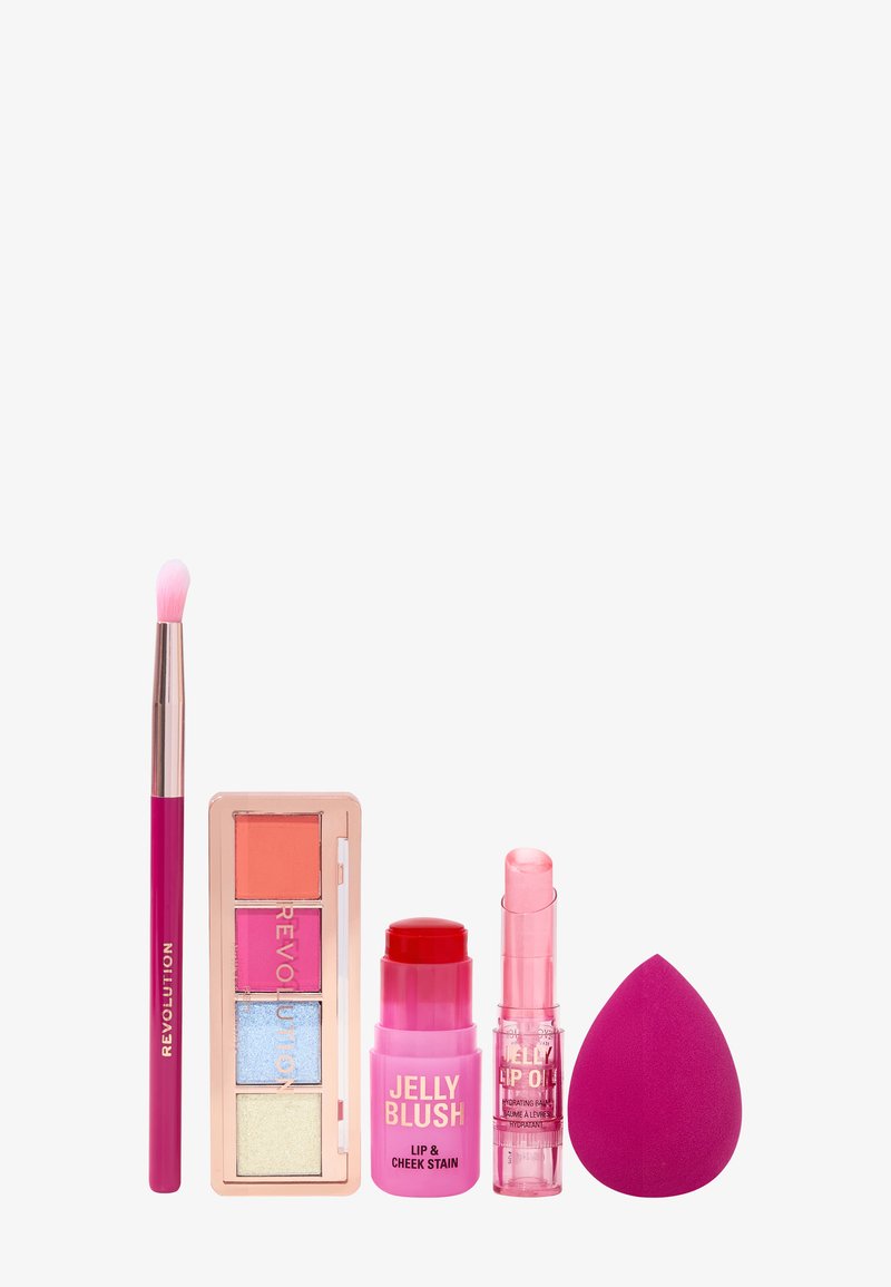 Das Make-up-Set beinhaltet einen rosa Make-up-Pinsel, ein Kompakt mit vier bunten Schattierungen, einen rosa Rouge-Stift, ein rosa Lippenöl und einen rosa Beauty-Blender.