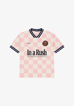 Lyserød og hvid ternet kortærmet skjorte med sort og hvid stribet krave og manchetter, med teksten "In a Rush International" og rundt logo.