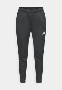 Μαύρο αθλητικό παντελόνι με εφαρμοστή γραμμή, ελαστική μέση και πλαϊνές τσέπες. Διαθέτει μικρό λευκό λογότυπο Adidas στο αριστερό μηρό.