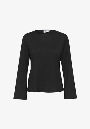 Bluză lungă cu mâneci din material texturat, de culoare neagră. Prezintă un decolteu rotund și o croială lejeră. Design simplu, fără aplicații.