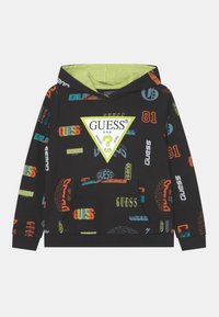 Felpa nera con interno verde, caratterizzata da loghi e grafiche colorate "GUESS", tasca frontale e polsini a coste.